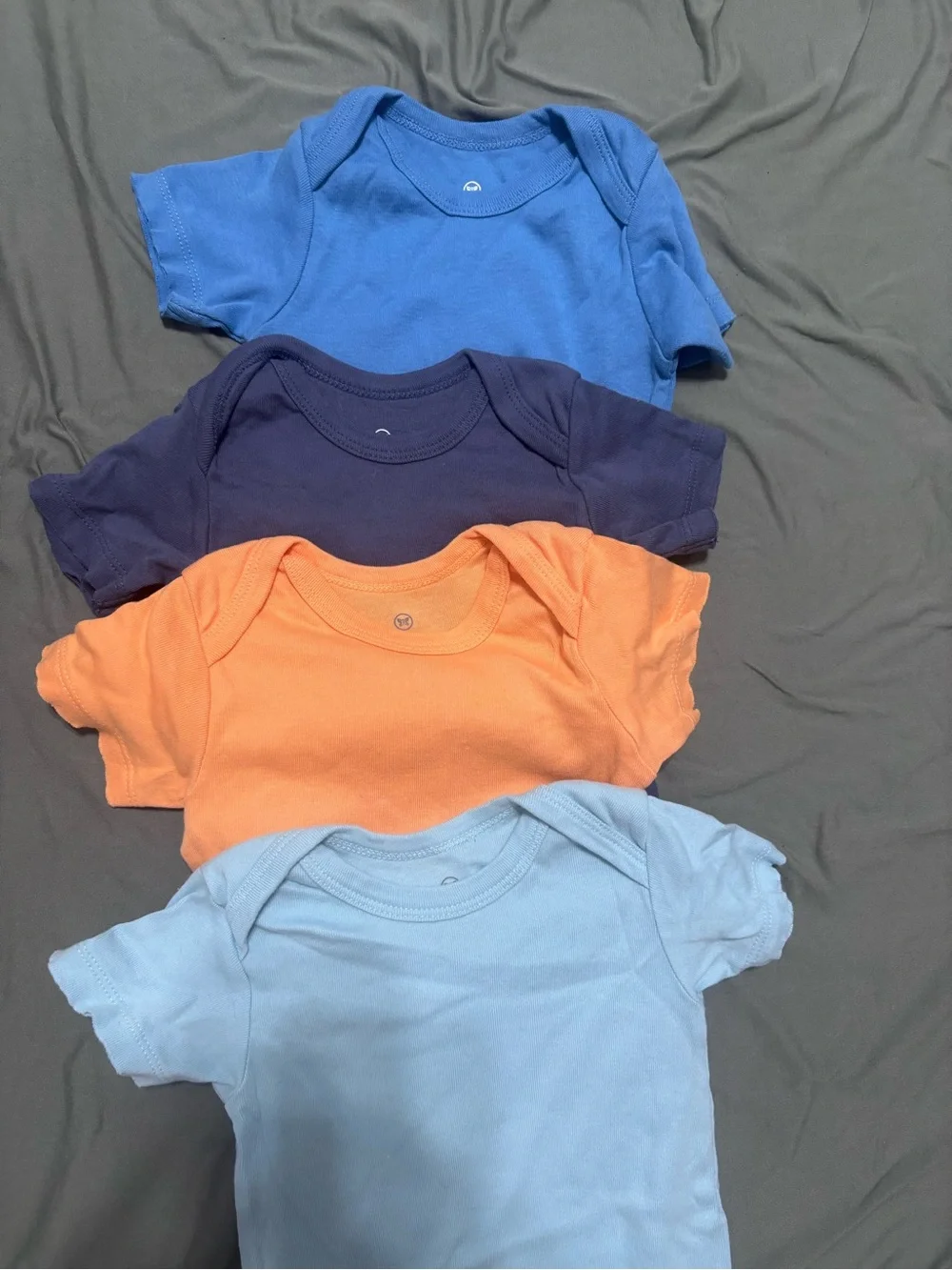 Lot of 4 honest brand onesies 12 month short sleeve